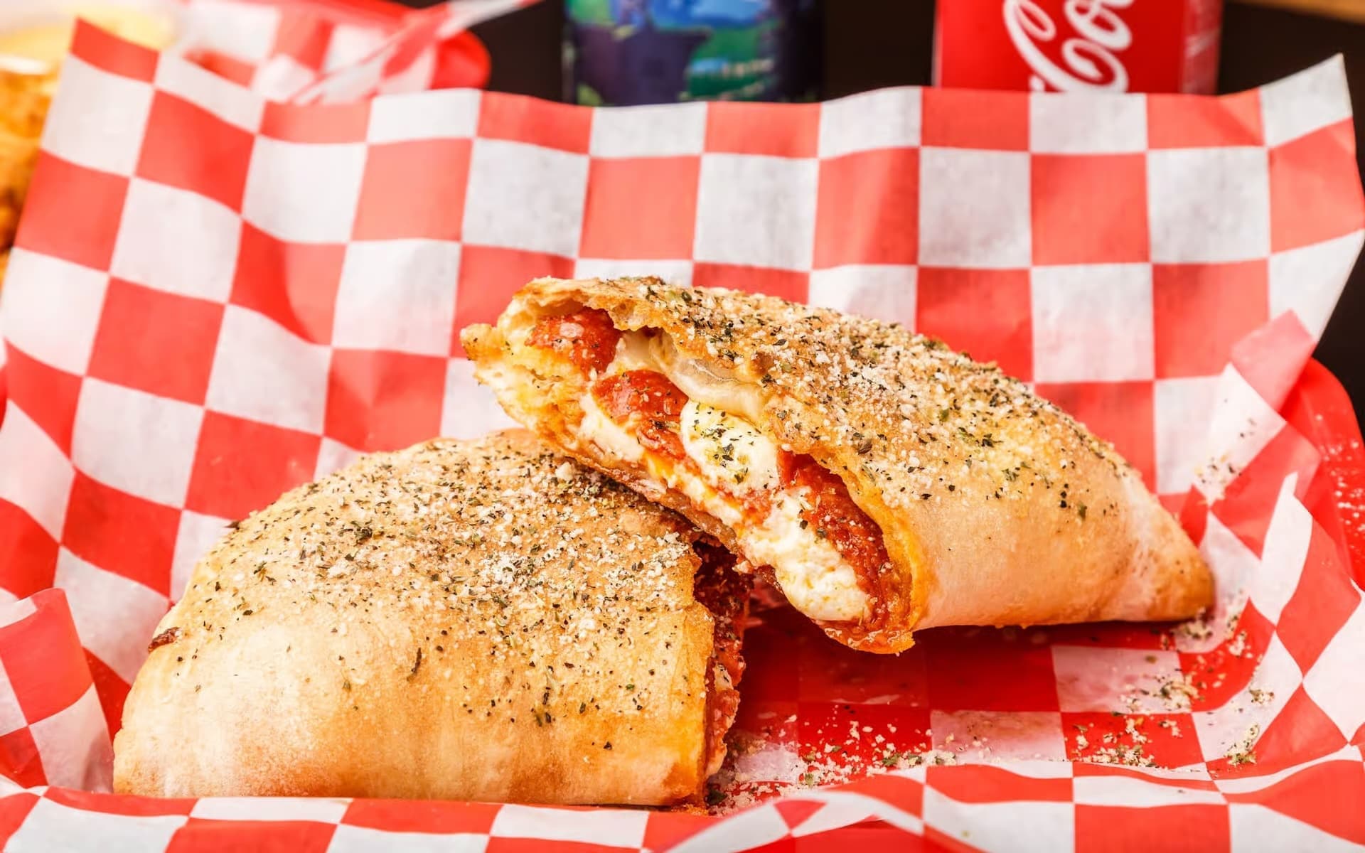 Eddie's Calzones cheese pull from a hand-tossed calzone, cross-section, made to order